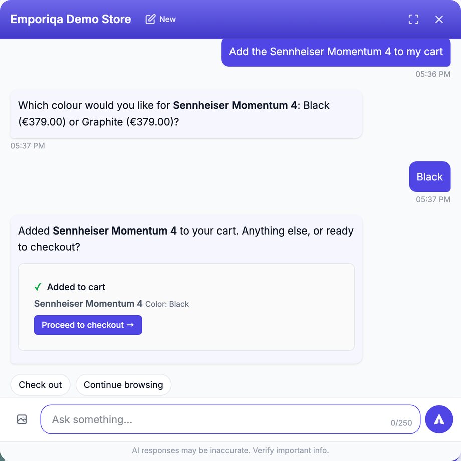 Emporiqa chat widget on the Emporiqa Demo Store. The shopper writes "Add the Sennheiser Momentum 4 to my cart". The assistant asks which colour: Black (€379.00) or Graphite (€379.00). The shopper answers "Black". The assistant replies "Added Sennheiser Momentum 4 to your cart. Anything else, or ready to checkout?" and shows an added-to-cart card with a green tick, the product name, Color: Black, and a Proceed to checkout button. Two suggestions follow, Check out and Continue browsing.
